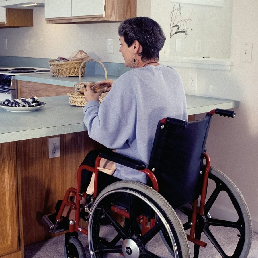Support worker with a person using a wheelchair
